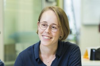 Smilling group of friends in office