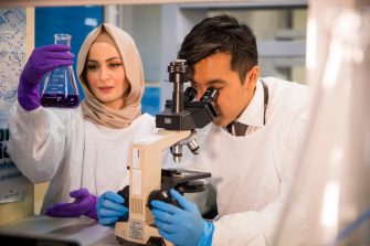 Photograph of students studying medicine