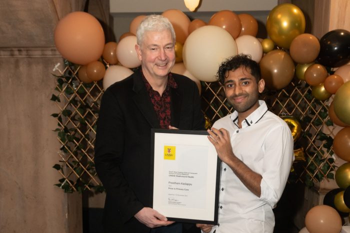 SWS clinical school graduate receiving a prize in primary care