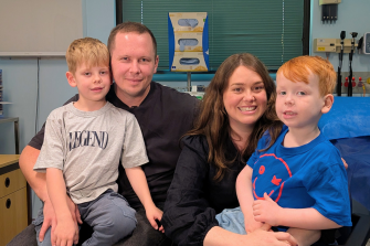 Mitch and Emily, with their two sons. Xavier, right, has spinal muscular atrophy.