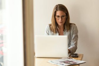 Woman sitting at laptop