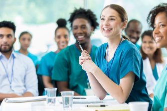 Attentive nursing students in class stock photo