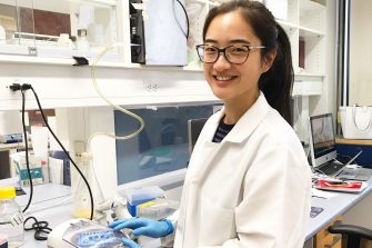 Daisy Shu using a centrifuge