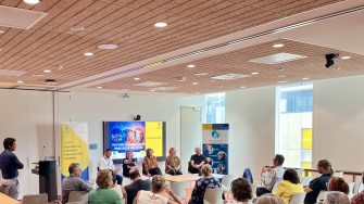 panel discussion in front of audience