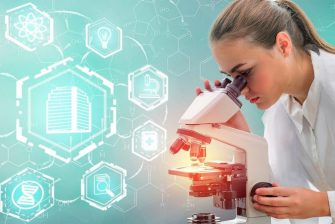 Female researcher observing through microscope