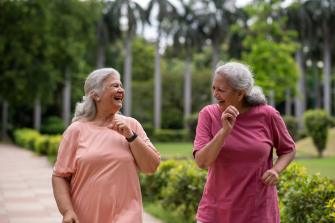 happy senior women jogging in the park.