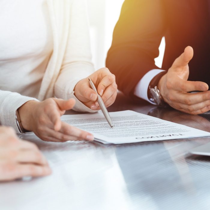 business people discussing with documents