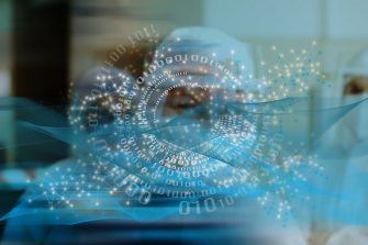 medical professional dressed in scrubs with an overlay of 1's and 0's