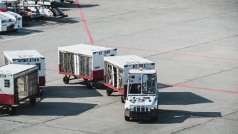 Baggage handling trucks on tarmac