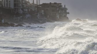 Waves breaking on shore