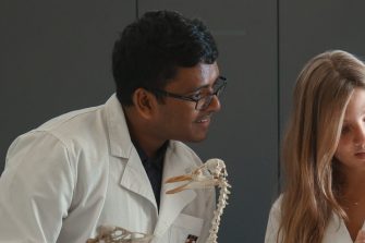 lab students looking at measurement