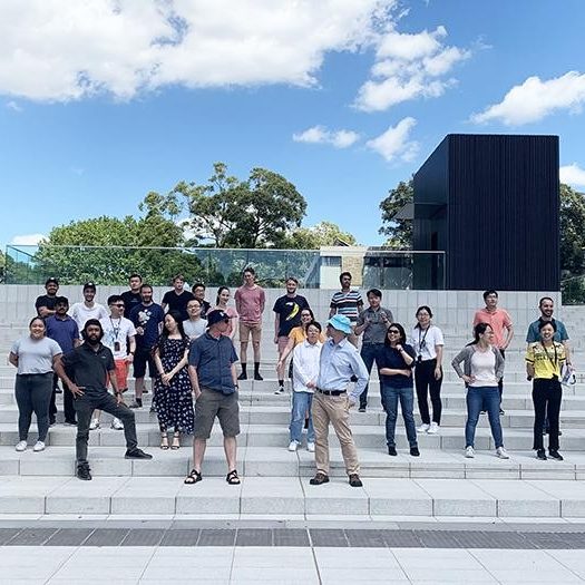 SMS End of Year Morning Tea, 09 December 2020, a social distancing group photo on the steps of the Esme Timbery Creative Practice Lab UNSW