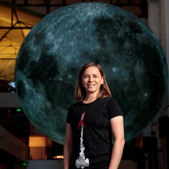 A photo of children smiling at the camera with the words 'Future You' on a teal backdrop behind them.