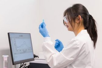 Julia Chov working in a lab