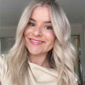 A headshot of a student looking at the camera and smiling.