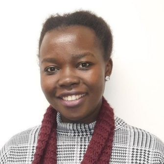 A headshot of a student looking at the camera and smiling.