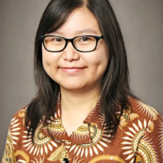 A headshot of a student looking at the camera and smiling.