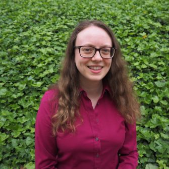 A headshot of a student looking at the camera and smiling.