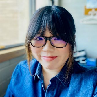 A headshot of a student looking at the camera and smiling.