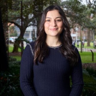 A headshot of a student looking at the camera and smiling.