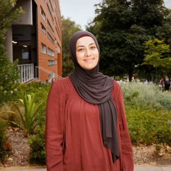 A headshot of a student looking at the camera and smiling.