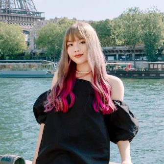 A headshot of a student looking at the camera and smiling.