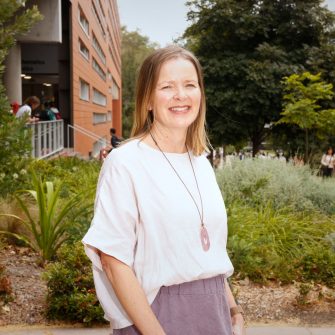 A headshot of a student looking at the camera and smiling.
