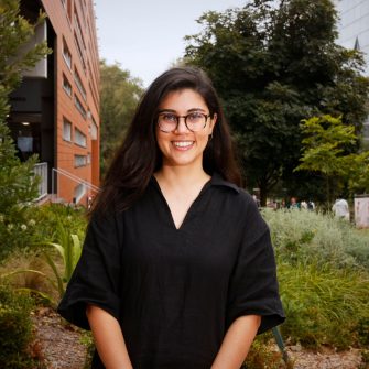 A headshot of a student looking at the camera and smiling.