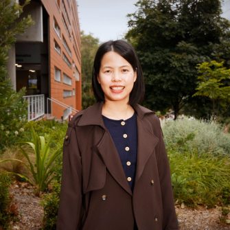 A headshot of a student looking at the camera and smiling.