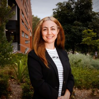 A headshot of a student looking at the camera and smiling.
