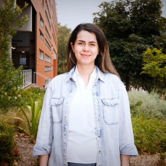 A headshot of a student looking at the camera and smiling.
