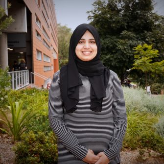 A headshot of a student looking at the camera and smiling.