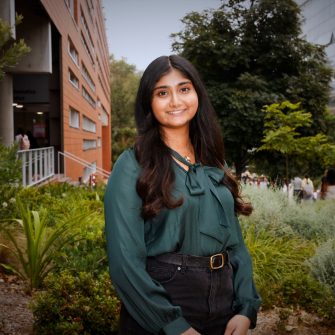 A headshot of a student looking at the camera and smiling.