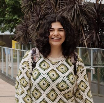 A headshot of a student looking at the camera and smiling.