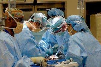 Surgeons in operating theatre