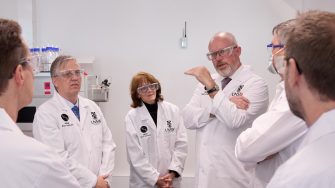 Scientists discussing stock