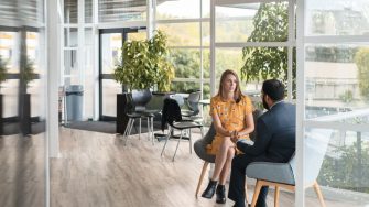 Two people in a meeting