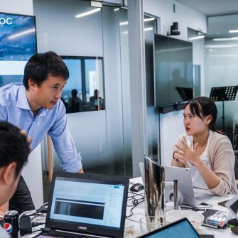 3 people in conversation