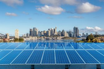 Sydney skyline with solar panels in the foreground