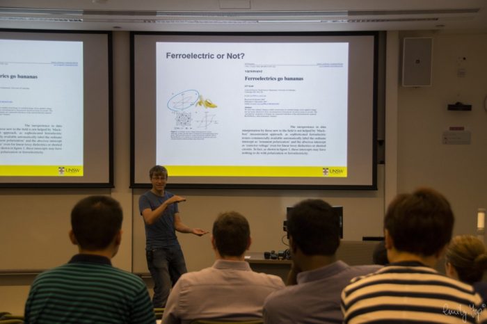 Man presenting in front of class