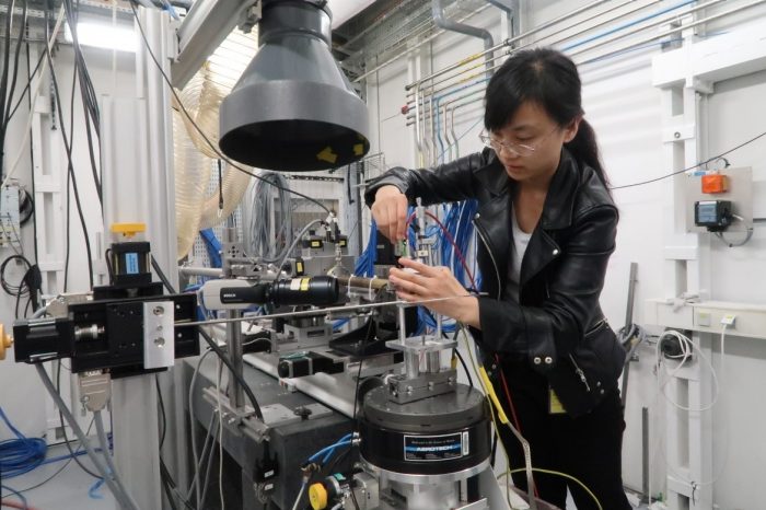 Woman working with equipment in a lab