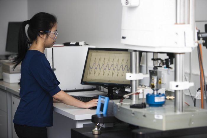 Woman working at computer in lab