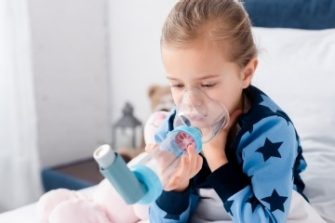 child with inhaler