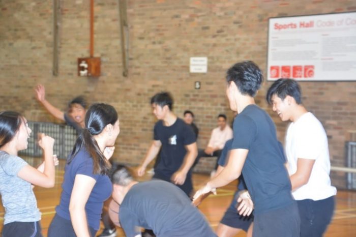 students playing basketball