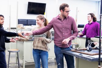 Team of Engineering Students at University Science Lab preparing for their project work