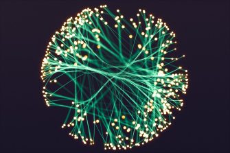 Glowing spheres connected with axon-like lines.