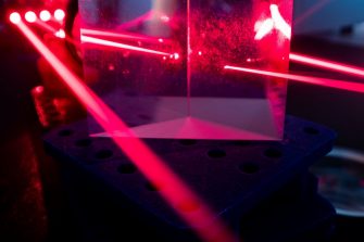 Experiment with red laser in optics lab