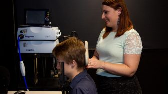 Photograph from the future mind psychology eventof multiple students discussing