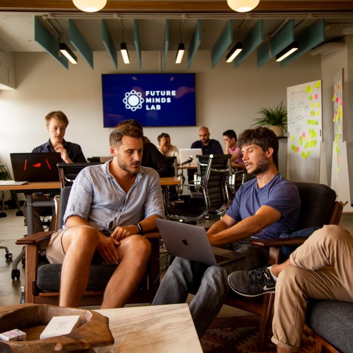 Photograph from the future mind psychology eventof multiple students discussing