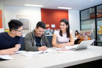 Students studying with books in the Library Support Unit (LSU)